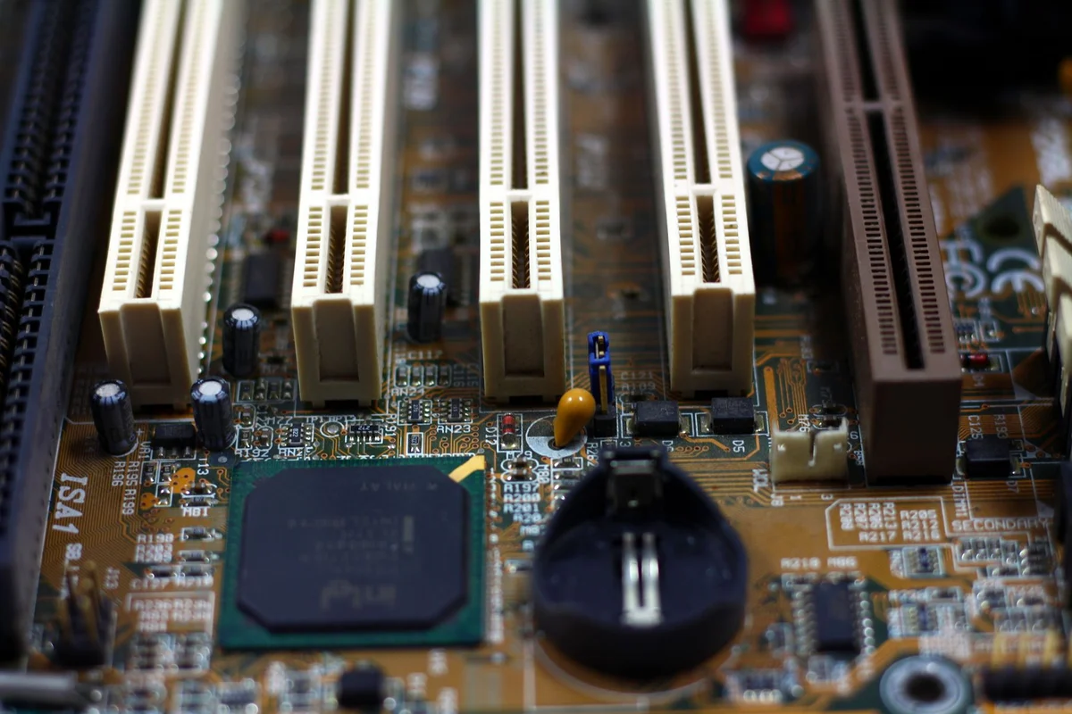 Motherboard with expansion slots and electronic components