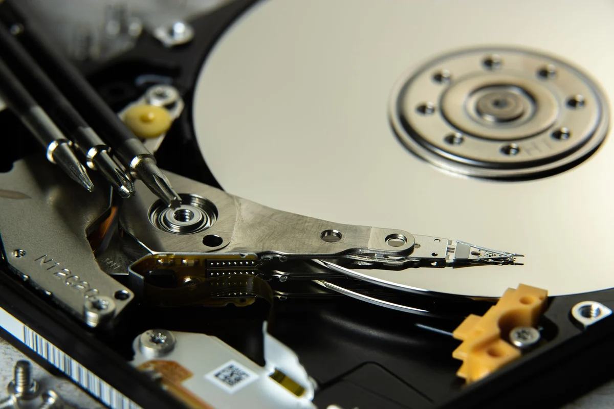 Close view of the mechanism inside an opened hard drive