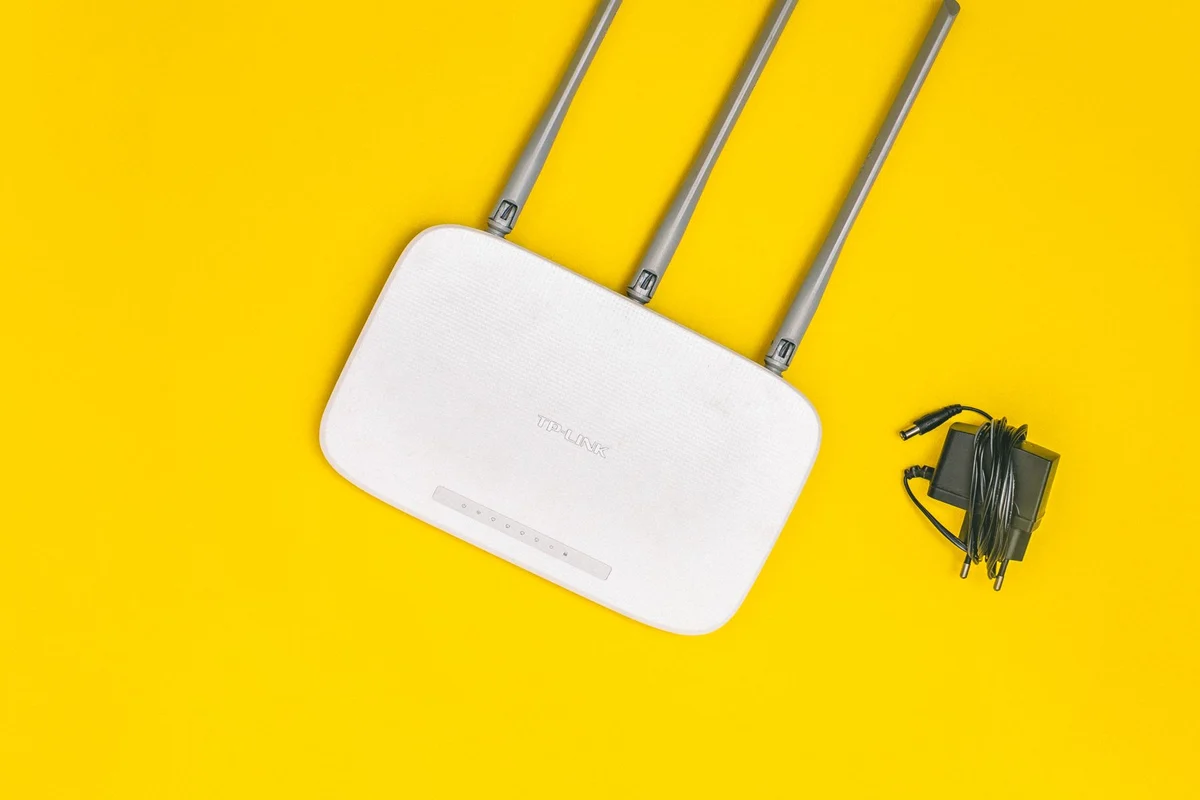 White wireless router with three antennas