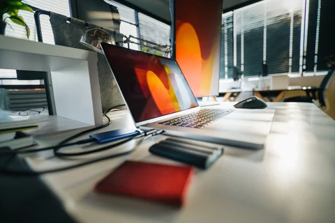 External drives beside a laptop
