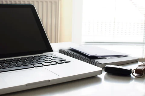 Compact laptop on a light desk