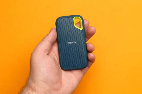 Hand holding a portable SSD