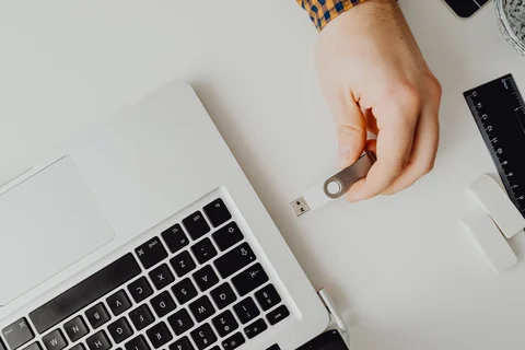 USB drive beside a laptop port