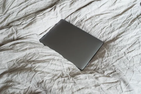 Closed laptop on a light surface