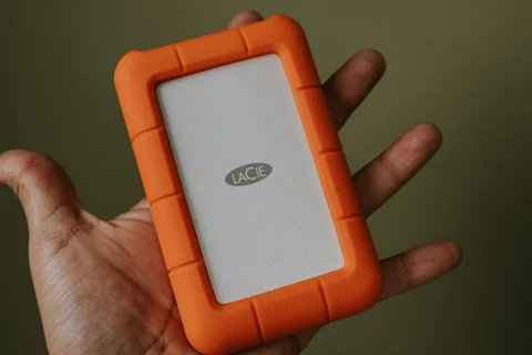 Portable drive with an orange protective shell